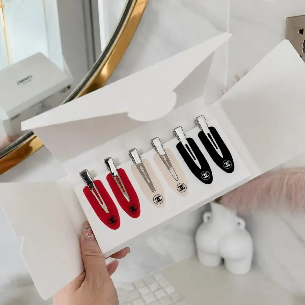 CHANEL Beauté Hair Clip Set – 6 Piece Red, Beige & Black